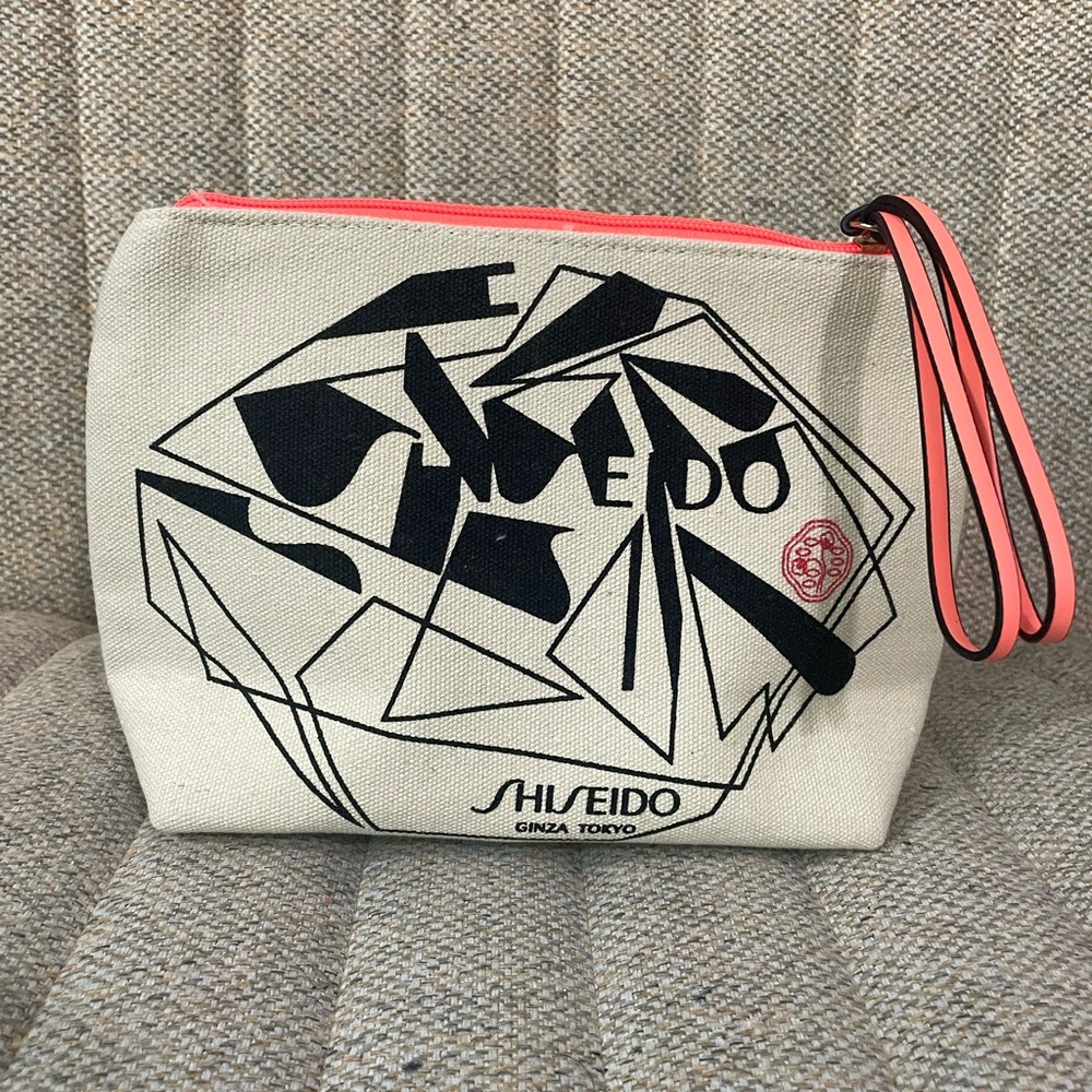 SHISEIDO Beige Canvas Makeup Bag with Black and Pink Details
